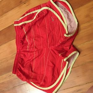 Red Nike running shorts